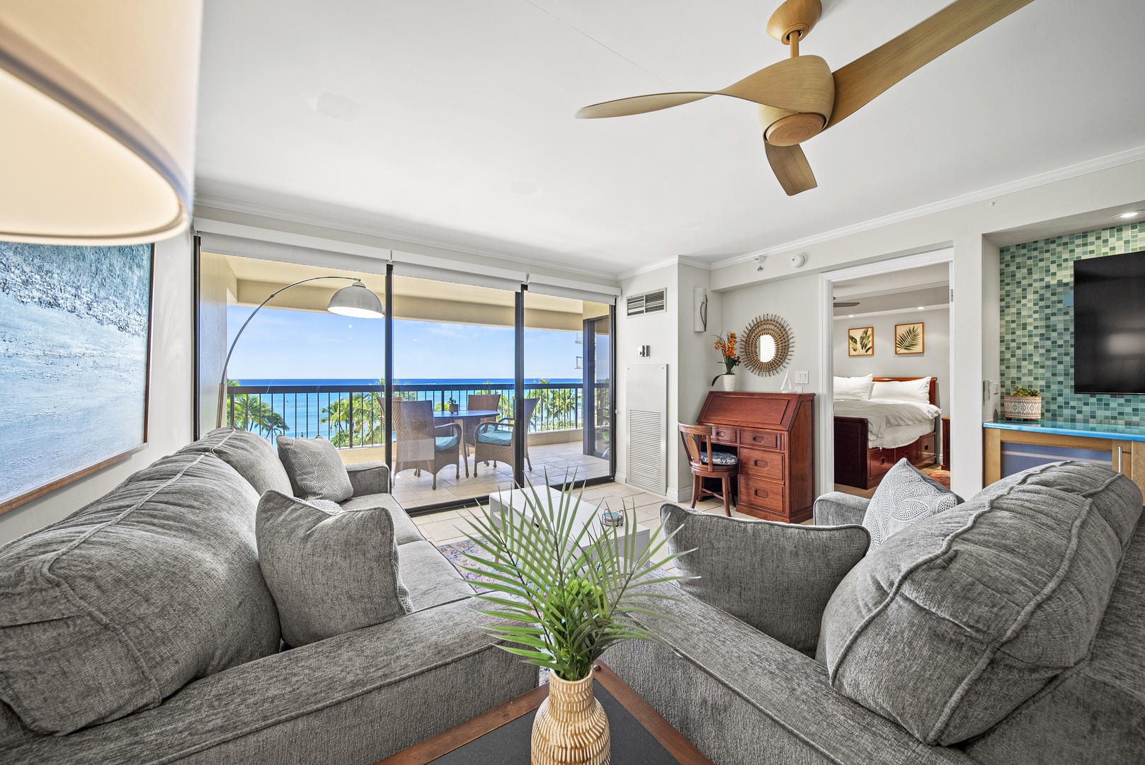 Honolulu Vacation Rentals, Aston Waikiki Beach Tower 602 - Wall-to-wall windows frame stunning Waikiki views in this spacious and modern living area.