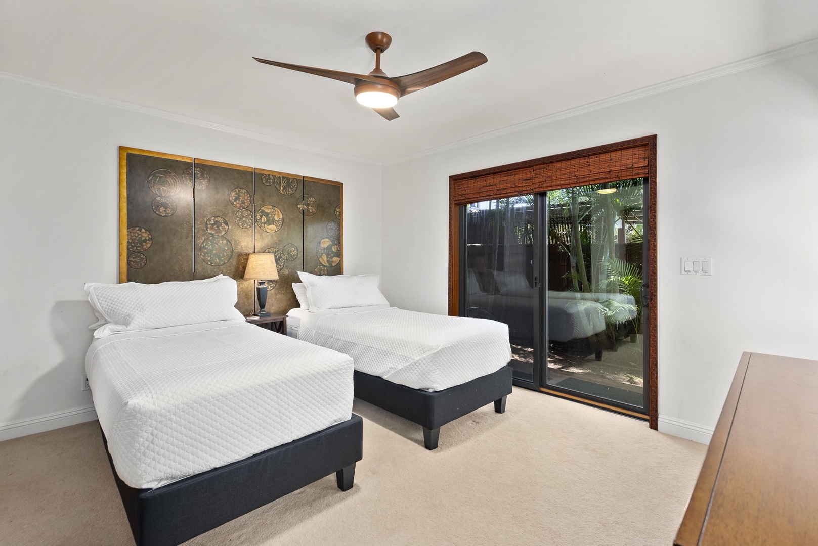 Haleiwa Vacation Rentals, Kealoha Tropical Beach Villa - The downstair guest bedroom two features two twin XL beds that convert to Cal king.