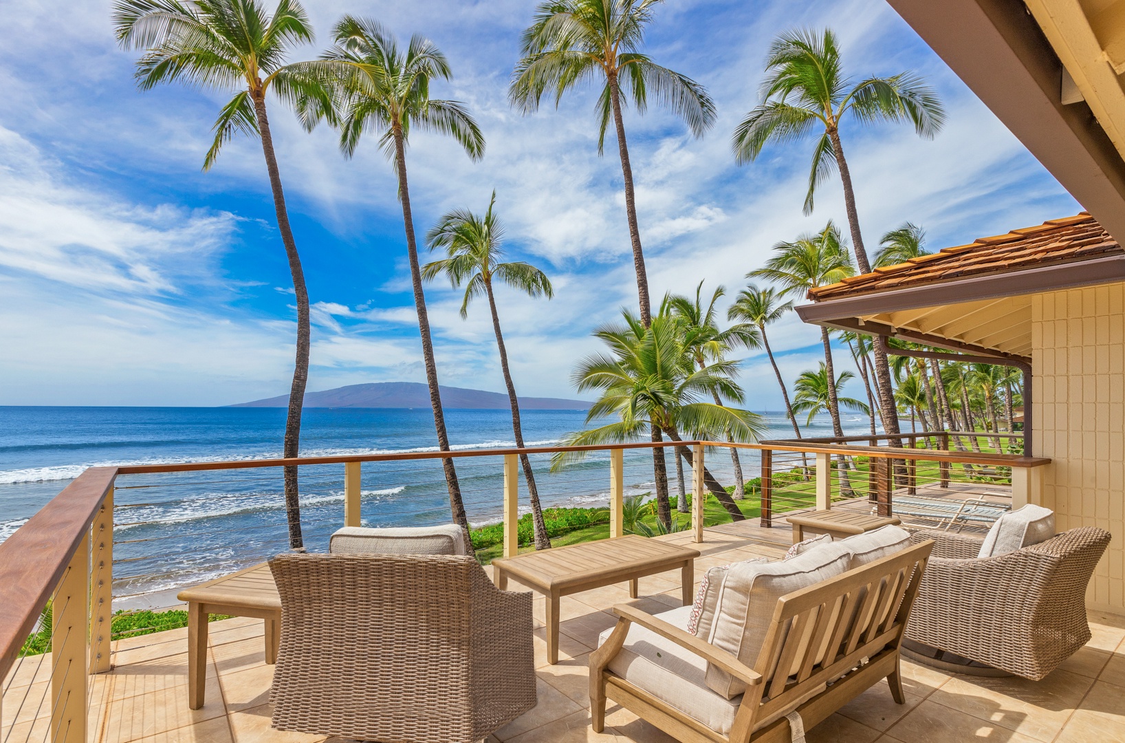 Lahaina Vacation Rentals, Puamana 254-2 - Unwind on the upstairs lanai, perfect for sunbathing, reading, or simply enjoying the ocean views.