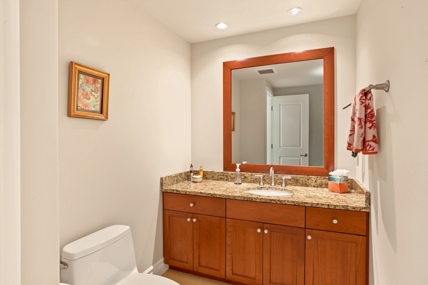 Princeville Vacation Rentals, Hale Hau'oli Moku - A separate powder room, so no need to go upstairs when gathered in the common areas.