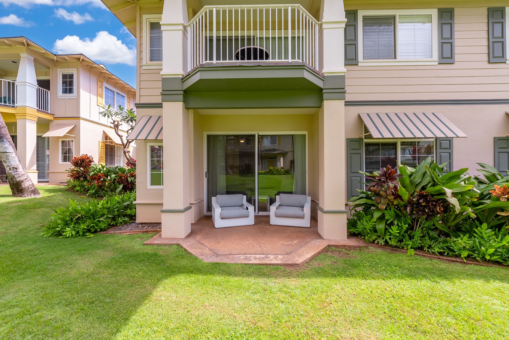 Kapolei Vacation Rentals, Kai Lani Luxury 6D - Private lanai area with comfortable chairs, perfect for enjoying morning coffee or evening relaxation.