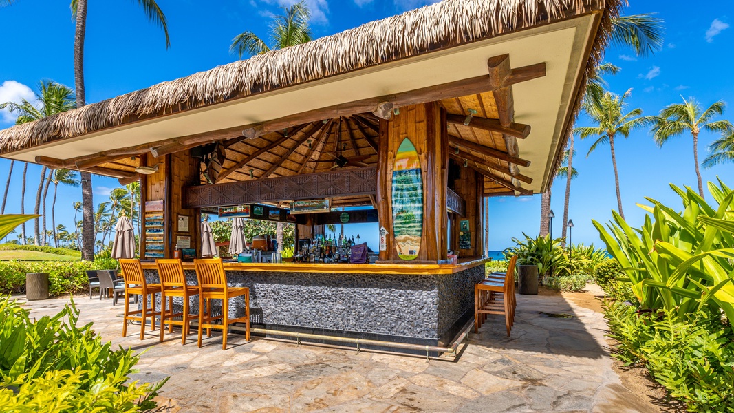 Kapolei Vacation Rentals, Ko Olina Beach Villas B210 - Thatched-roof poolside bar for tropical drinks.