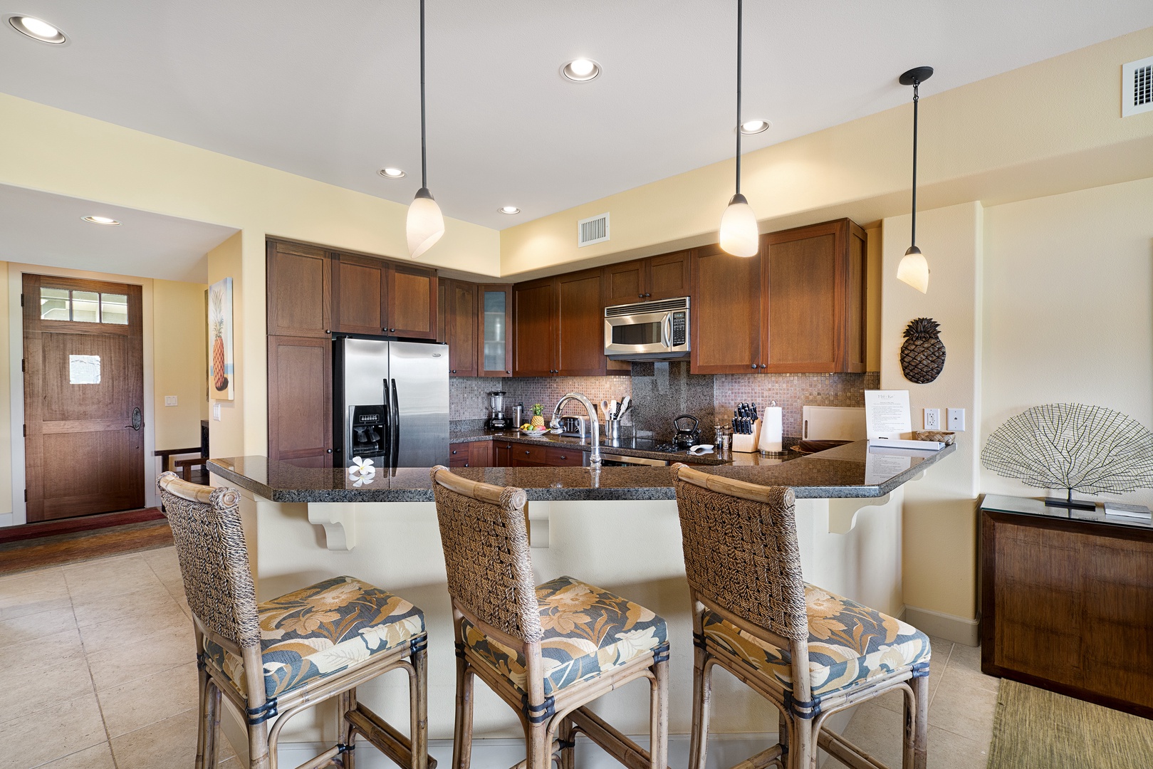 Waikoloa Vacation Rentals, Hali'i Kai at Waikoloa Beach Resort 9F - Kitchen and dining area will make hanging out with friends a pleasure