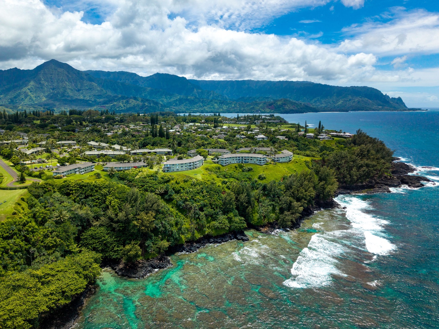 Princeville Vacation Rentals, Alii Kai 7201 - Reef and shoreline unfold below the mountains, the north shore at its most dramatic.
