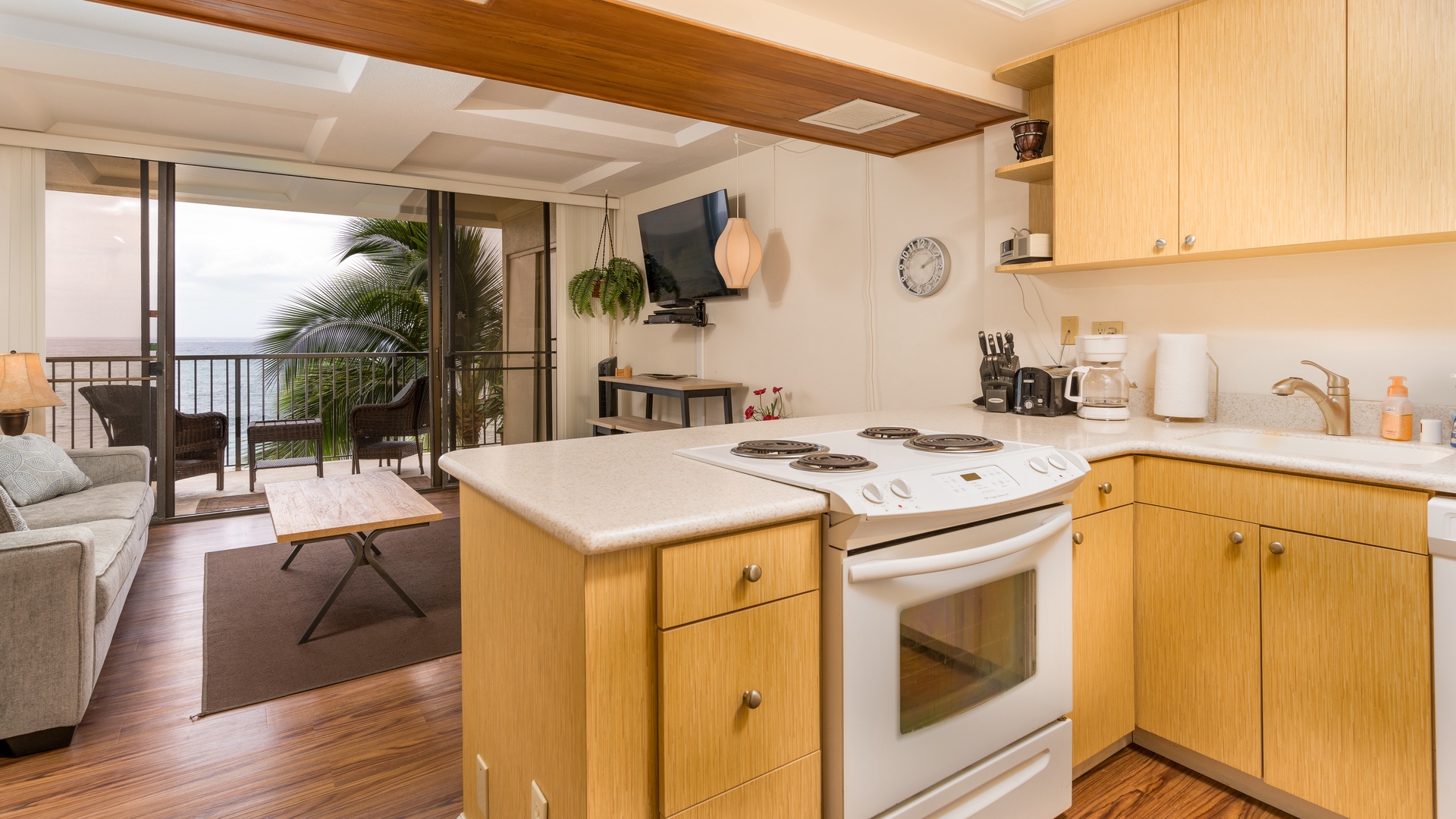 Waianae Vacation Rentals, Makaha - Hawaiian Princess - 305 - The kitchen with a view looking towards the lanai.