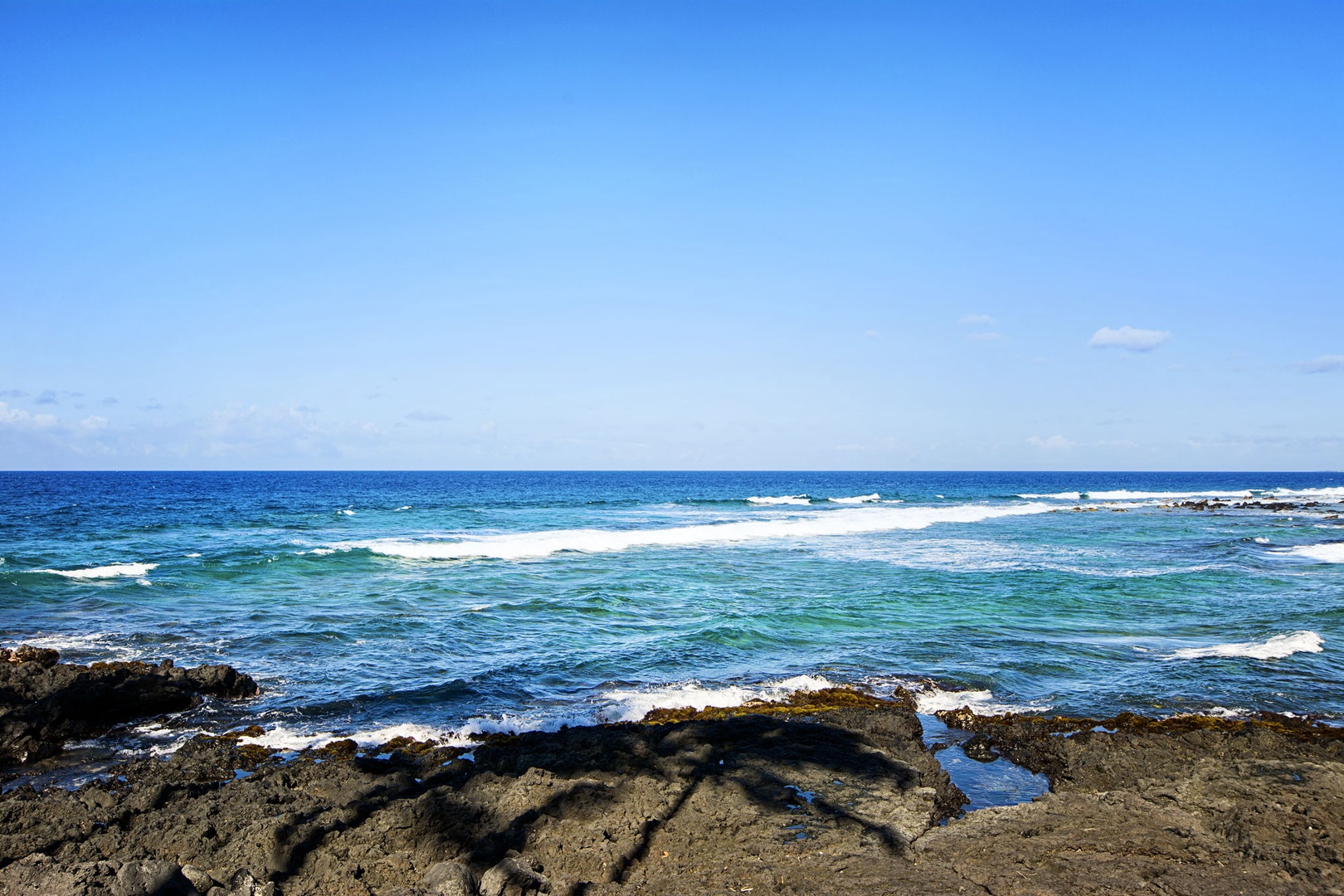 Kailua Kona Vacation Rentals, Keauhou Kona Surf & Racquet 1104 - More coastline to take in, waves folding over the lava shelf below.