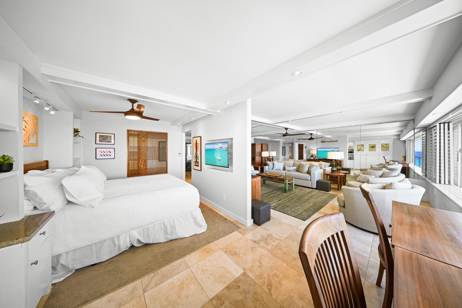 Honolulu Vacation Rentals, Kaimana Shores Getaway - The open bedroom layout flows seamlessly toward the living space, creating a bright and airy island retreat.
