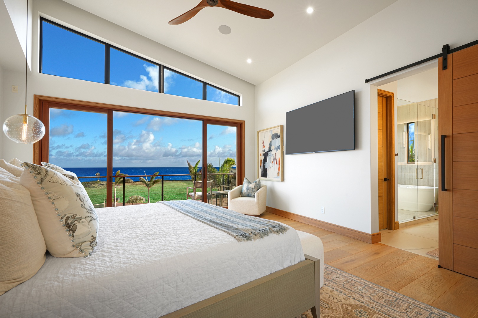 Koloa Vacation Rentals, Hale Makau - The second guest suite with TV, ensuite bath and floor-to-ceiling windows.