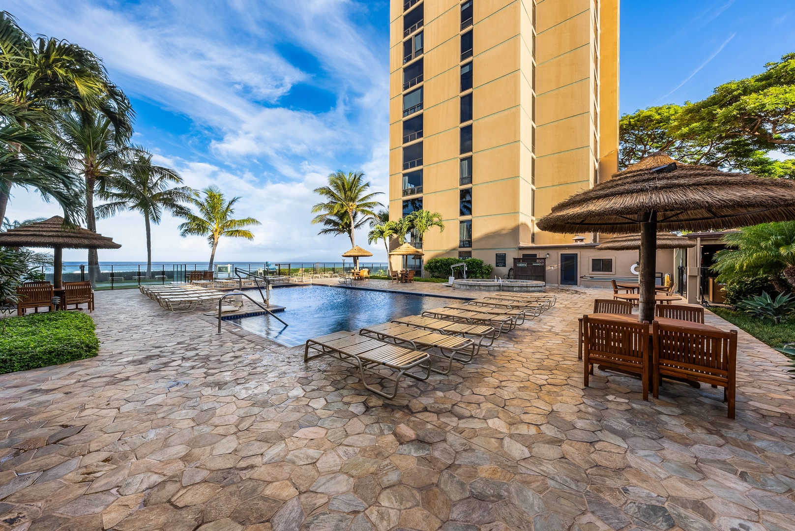 Lahaina Vacation Rentals, Mahana 1119 - Dive into tropical bliss at Mahana 1119 pool with ocean views and swaying palm trees.