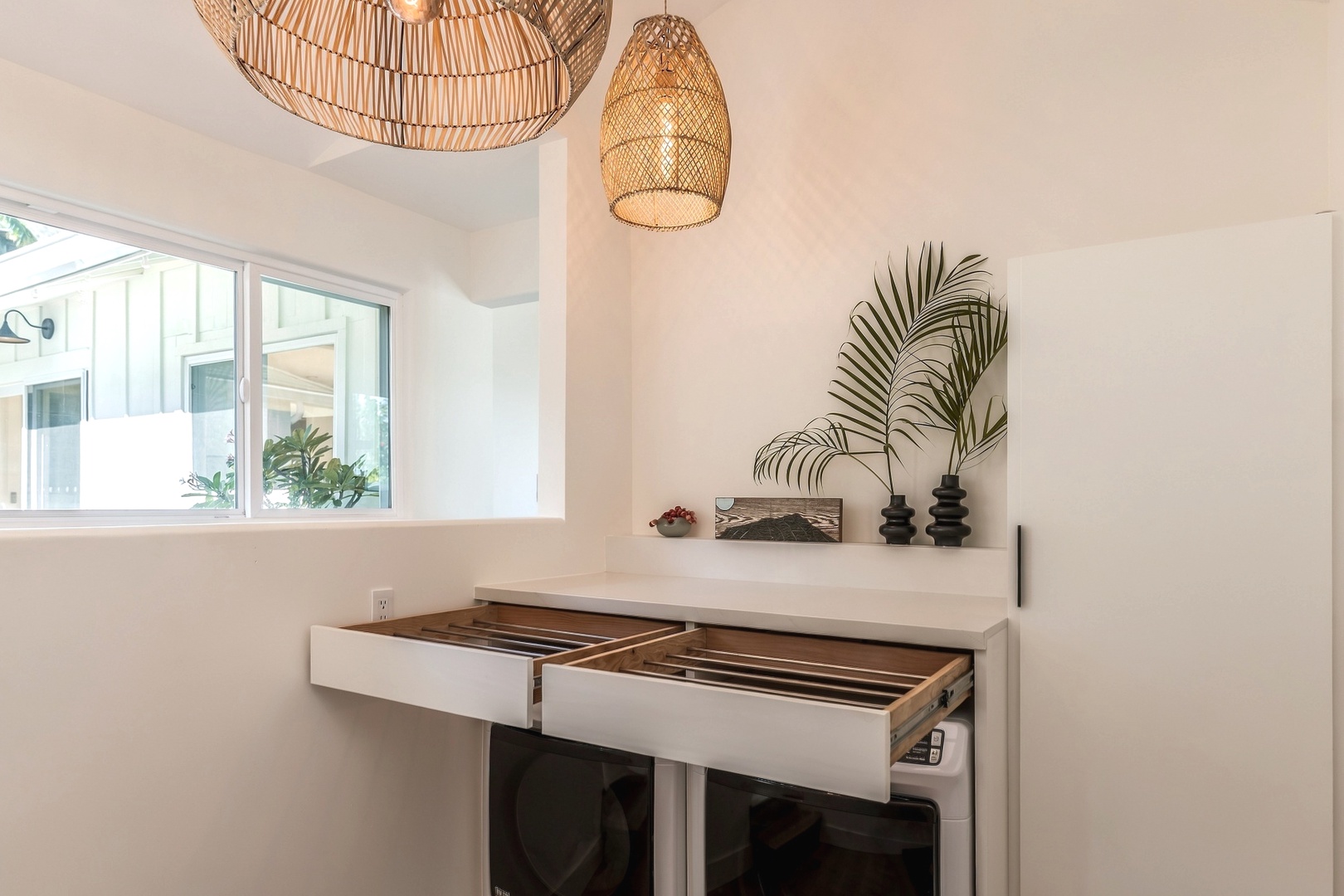 Kailua Vacation Rentals, Lanikai Ola Nani - Full-size laundry with its own daylight. Hang the wet swimsuits on the pull-out racks and pack half of what you planned.
