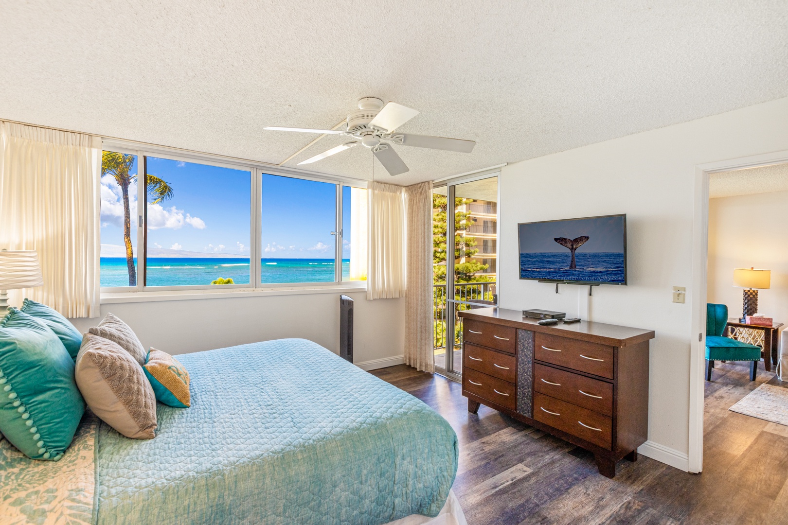 Lahaina Vacation Rentals, Royal Kahana 308 - This bright bedroom offers stunning ocean views, a king-size bed, and a flat-screen TV, providing both relaxation and entertainment.