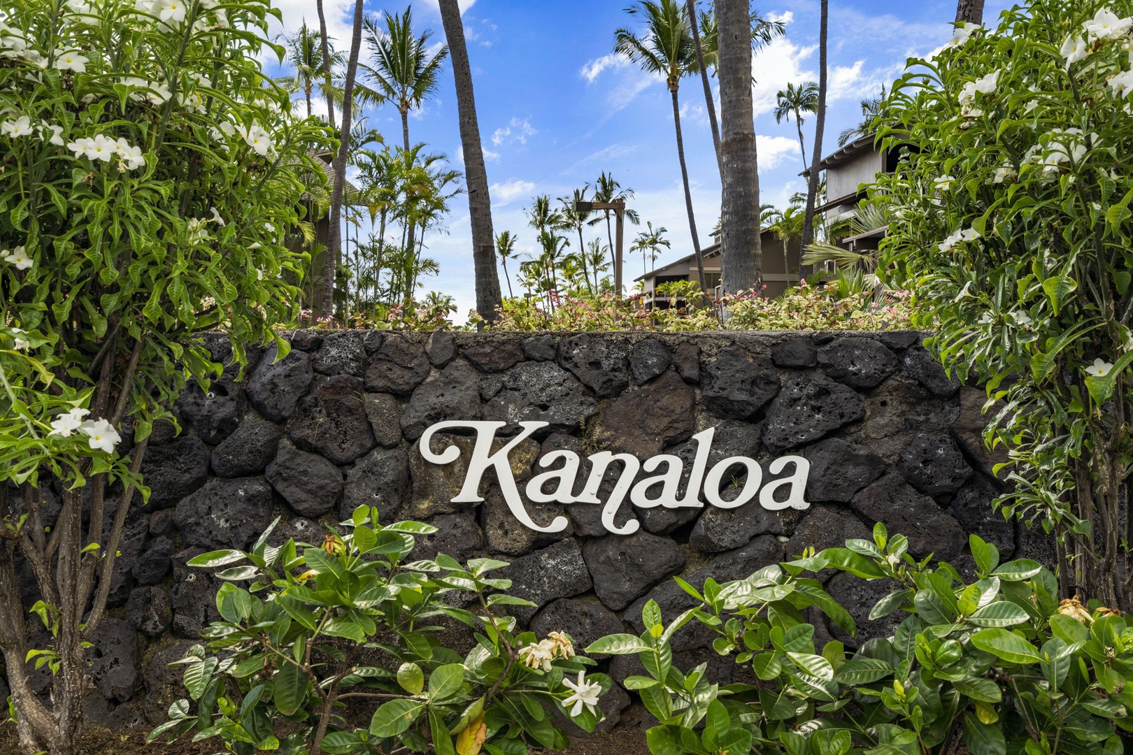 Kailua Kona Vacation Rentals, Kanaloa at Kona 1606 - The Kanaloa sign set in lava rock marks the turn into the grounds.