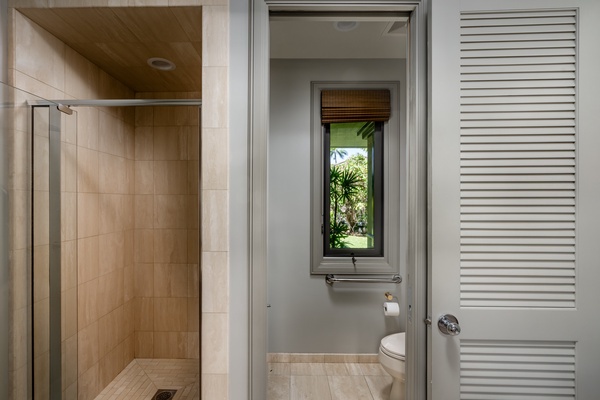 Kamuela Vacation Rentals, Canoe House & Beach Walker at Champion Ridge - Bathroom with a walk-in shower and a private water closet, offering a comfortable and functional layout.