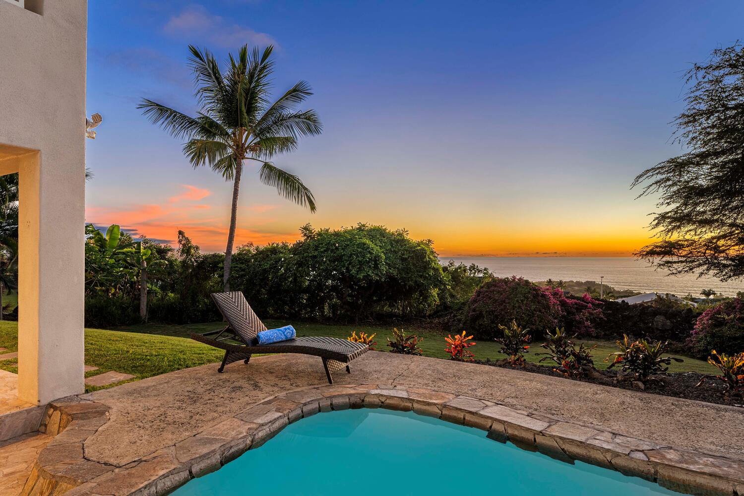 Kailua Kona Vacation Rentals, Ho'okipa Hale - Twilight by the pool transforms the backyard into a serene, sunset-soaked haven.