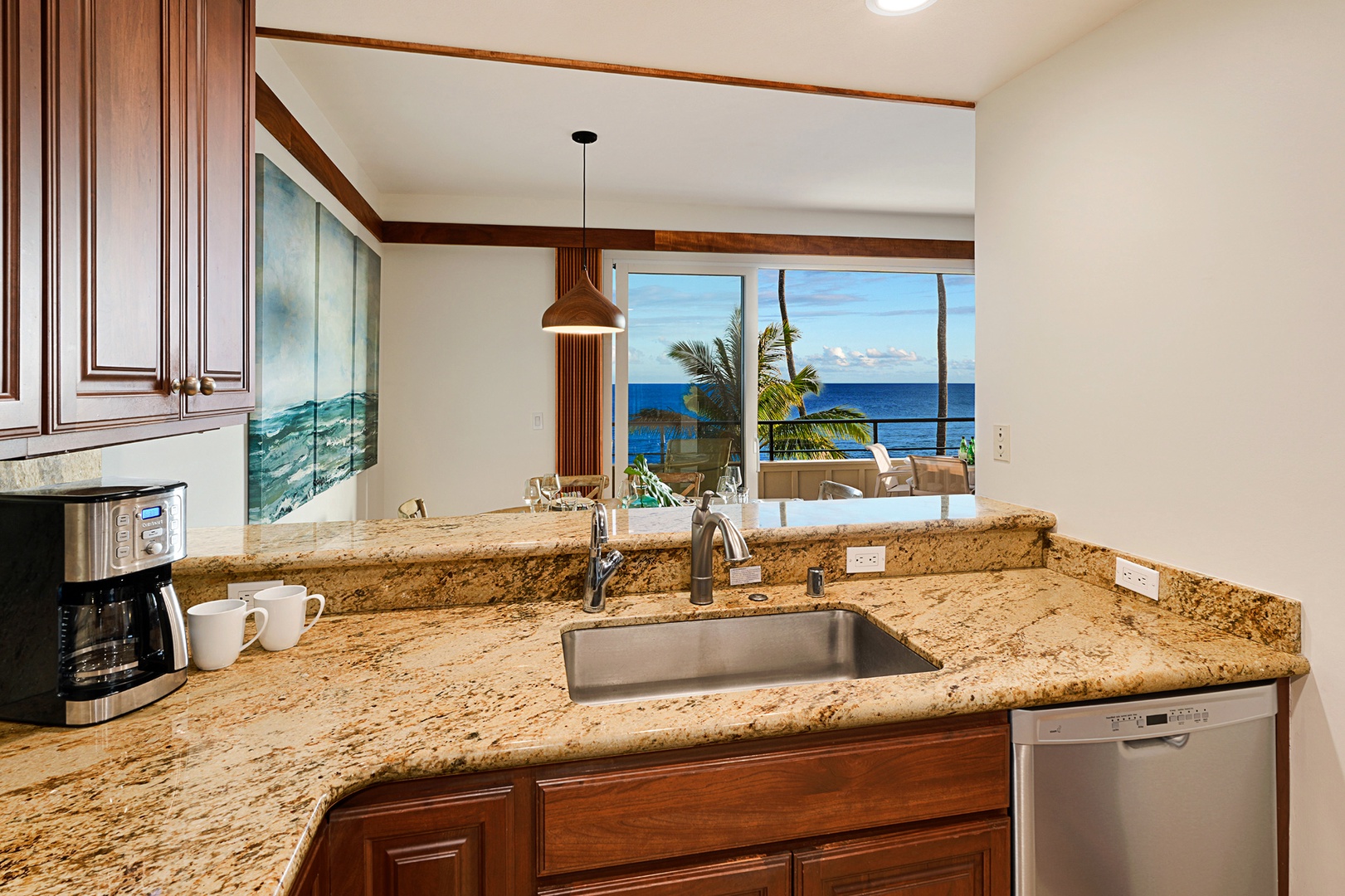 Koloa Vacation Rentals, Whalers Cove #133 - Prepare meals in a fully equipped kitchen with granite countertops and stainless steel appliances.