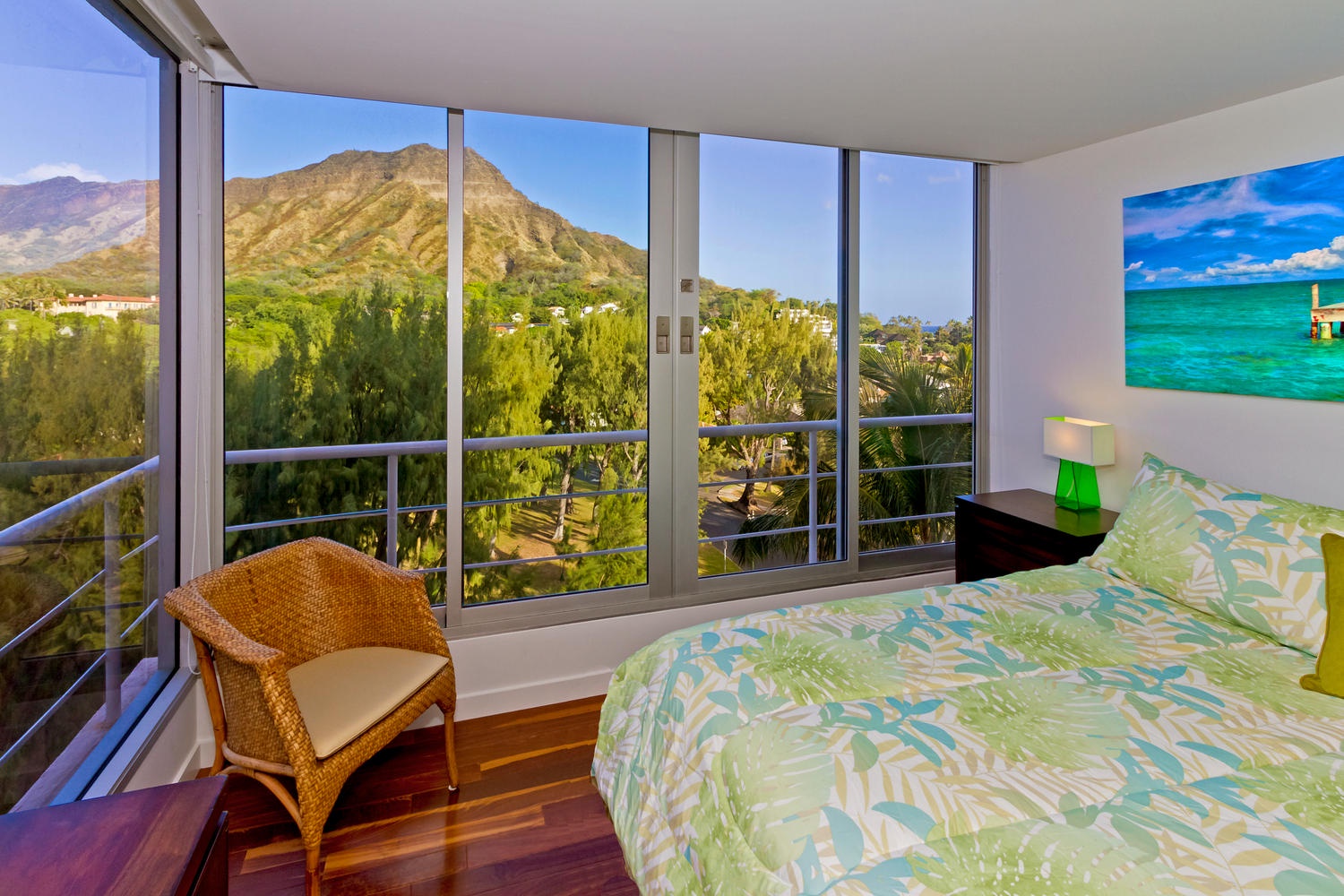 Honolulu Vacation Rentals, Executive Gold Coast Oceanfront Suite - Primary bedroom with Diamond Head views. Window AC unit is not pictured.