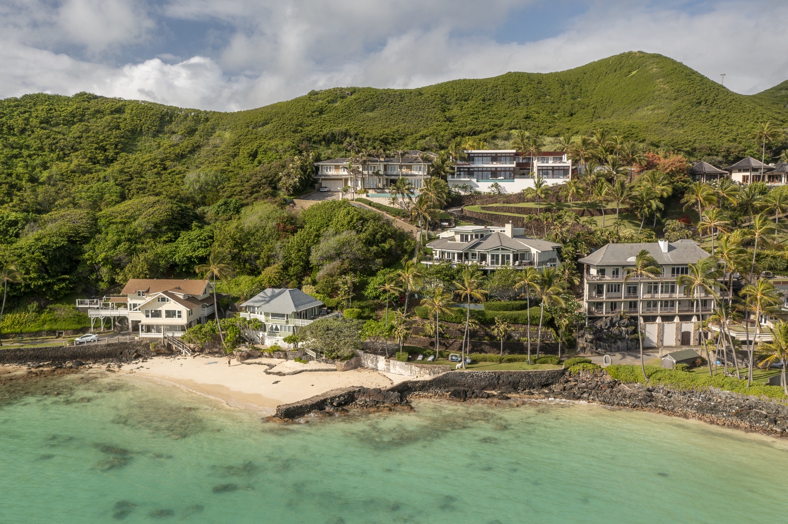 Kailua Vacation Rentals, Lanikai Hillside Estate - Aerial view of the property nestled against the mountains and steps away from the beach.