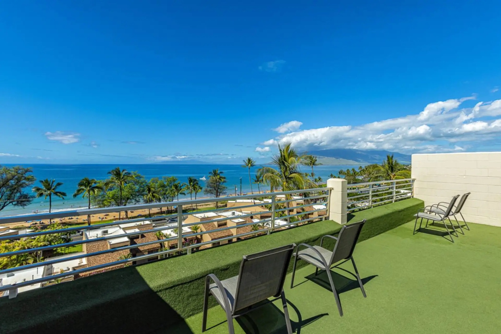 Kihei Vacation Rentals, Kamaole Beach Royal 610 - Grab a rooftop chair here and the ocean does the rest of the entertaining.