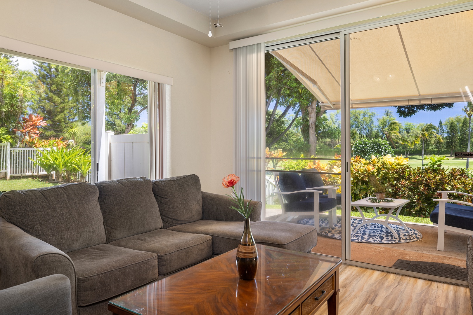 Sink into plush seating while enjoying seamless indoor-outdoor flow through sliding glass doors to your private covered patio.