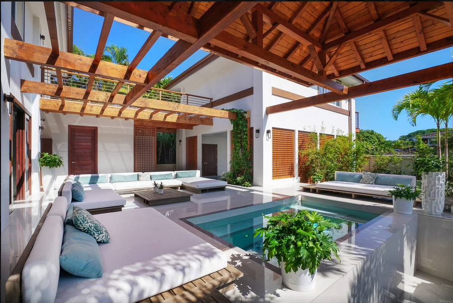 Honolulu Vacation Rentals, Diamond Head Villa* - Lounge beneath exposed beam ceilings beside your private pool—perfect for sun, shade, and serenity.