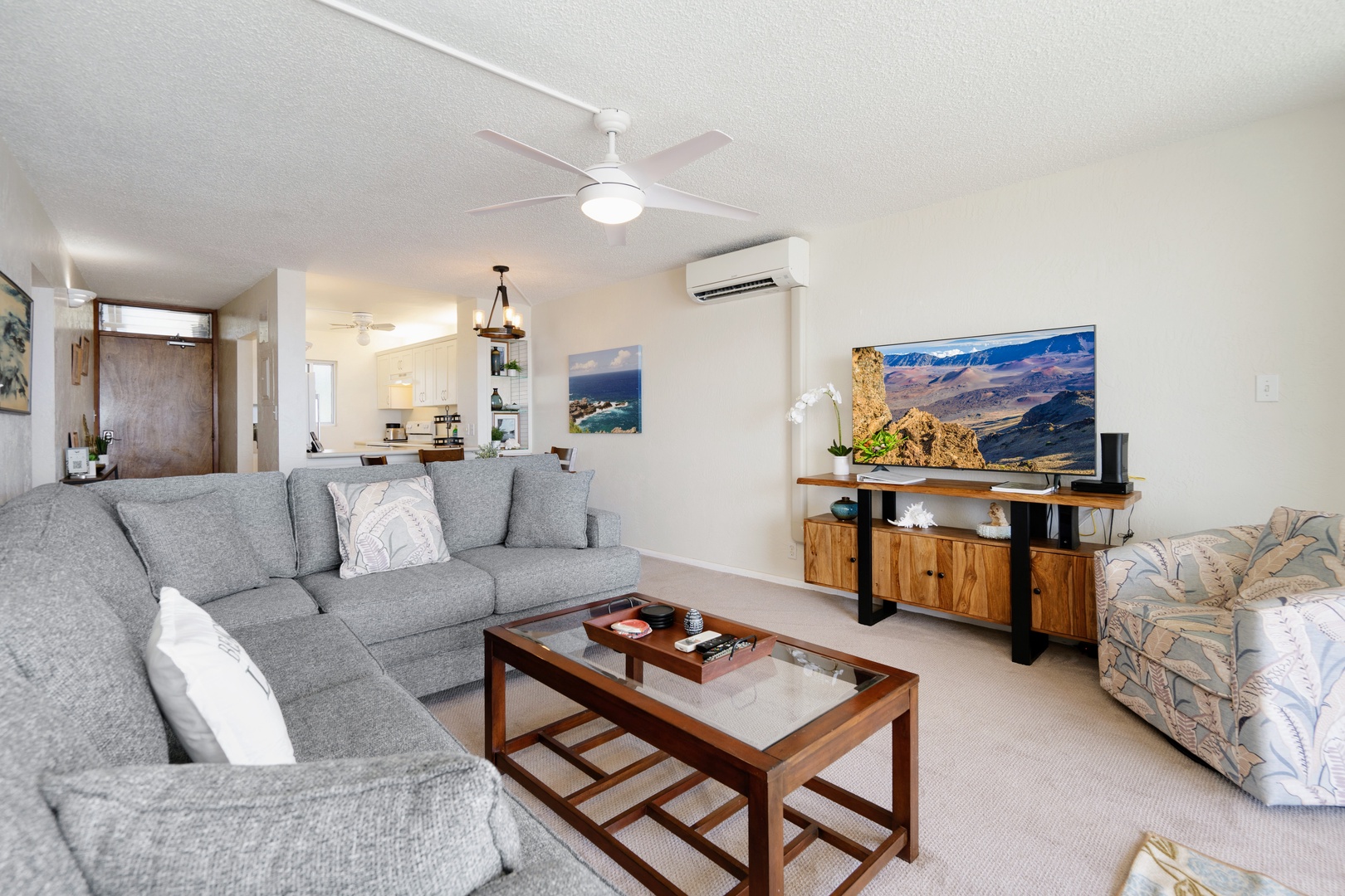 Kihei Vacation Rentals, Menehune Shores 316 - Settle the whole group onto one wraparound sectional built for a shared movie night.