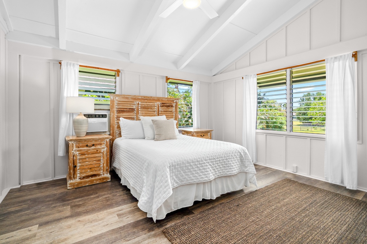 Hanalei Vacation Rentals, Hale Kanani (Kaua'i) TVNC 1342 - Two windows pour light across a second bedroom dressed simply in white.