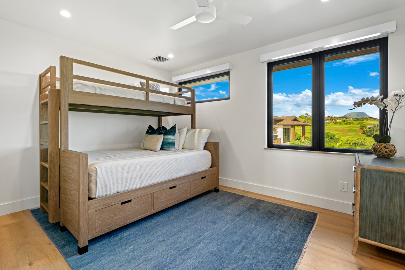 Koloa Vacation Rentals, Hale Laule'a at Kukui'ula - Your kids will love this stylish bunk room with beautiful mountain views and plenty of space to play and relax together.