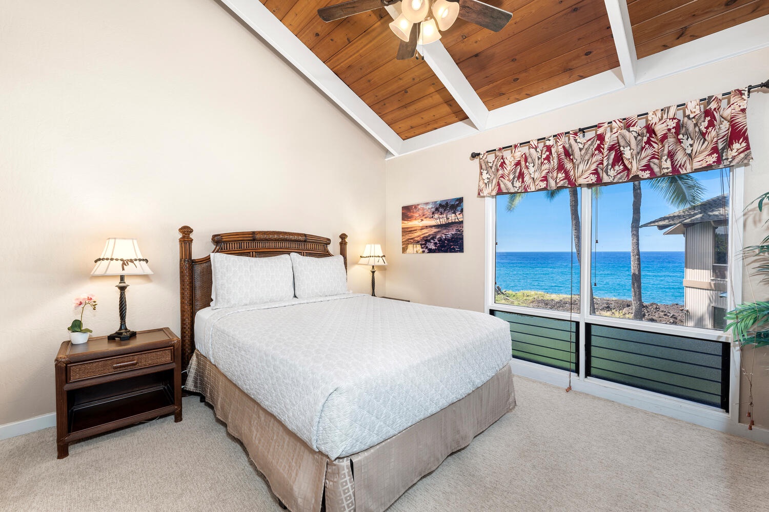 Kailua Kona Vacation Rentals, Kanaloa at Kona 3304 - Guest bedroom with queen bed, vaulted ceilings, and ocean views.