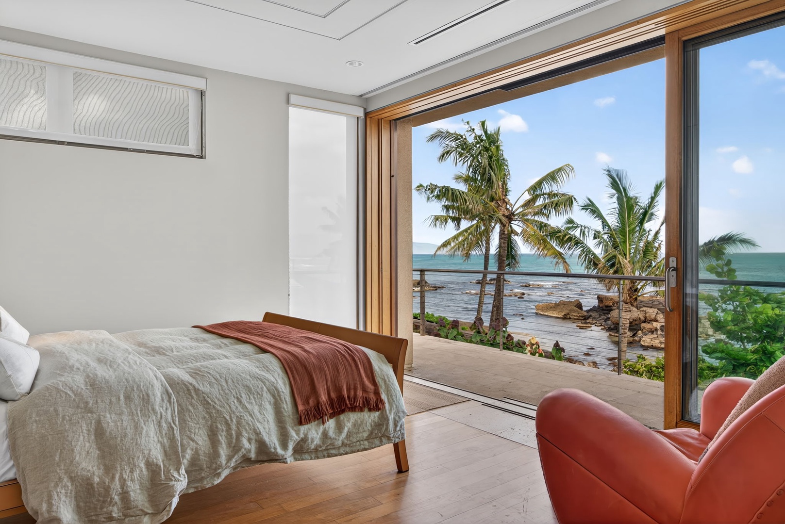 Haleiwa Vacation Rentals, HaleGator - Unwind in bed while taking in sweeping Pacific views through expansive glass doors that open to the oceanfront lanai.