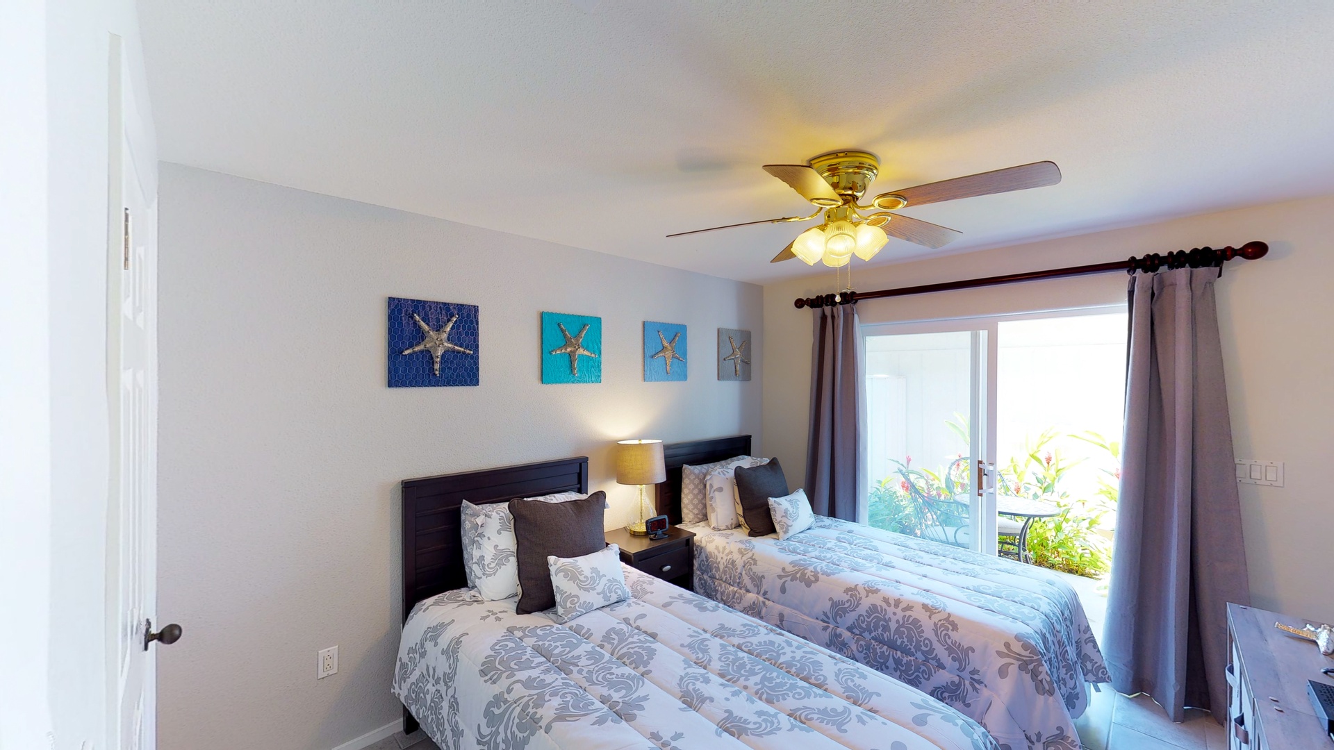 Kapolei Vacation Rentals, Coconut Plantation 1222-3 - The second guest bedroom with access to the lanai.