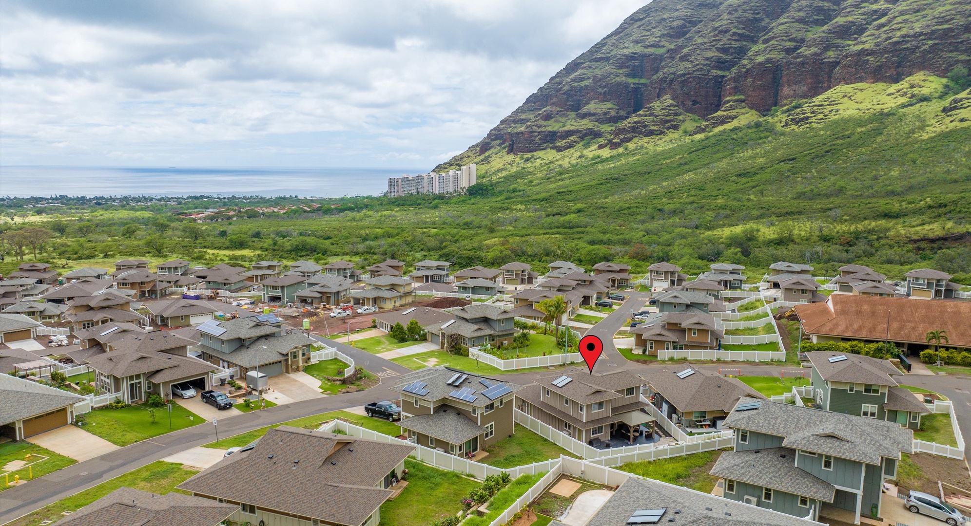 Makaha Valley Vacation Rentals, Makaha Valley Hale Kai** - Aerial view showing the home nestled in a scenic valley community.