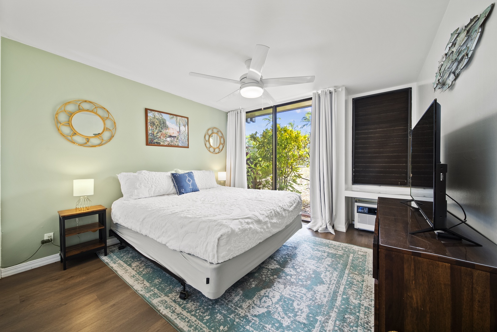 Kahuku Vacation Rentals, Pulelehua Kuilima Estates West #142 - Bedroom with a California King sized bed.