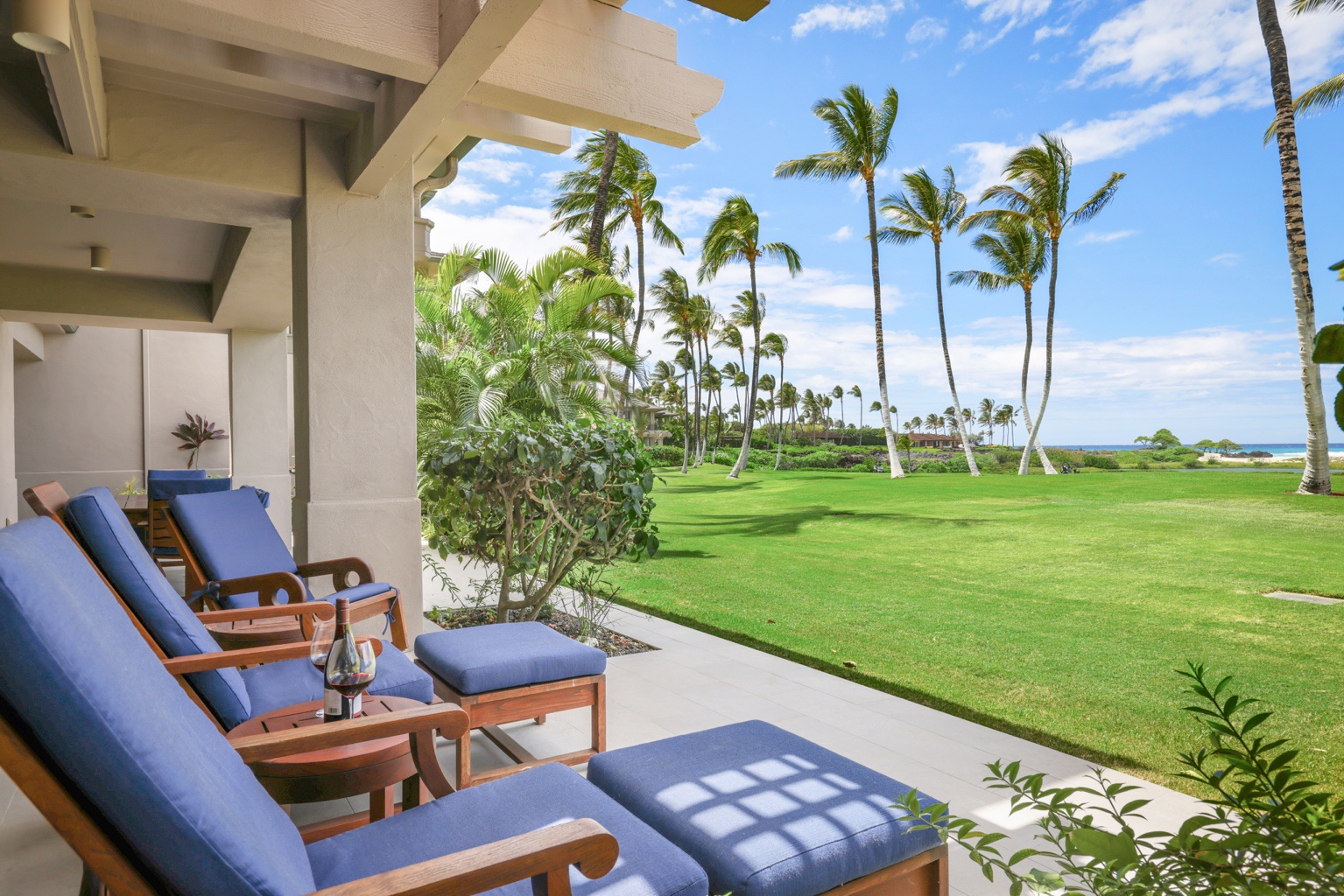 Kailua Kona Vacation Rentals, 3BD Golf Villa (3101) at Hualalai Resort - Enjoy a relaxing drink on the lanai with scenic golf course view.