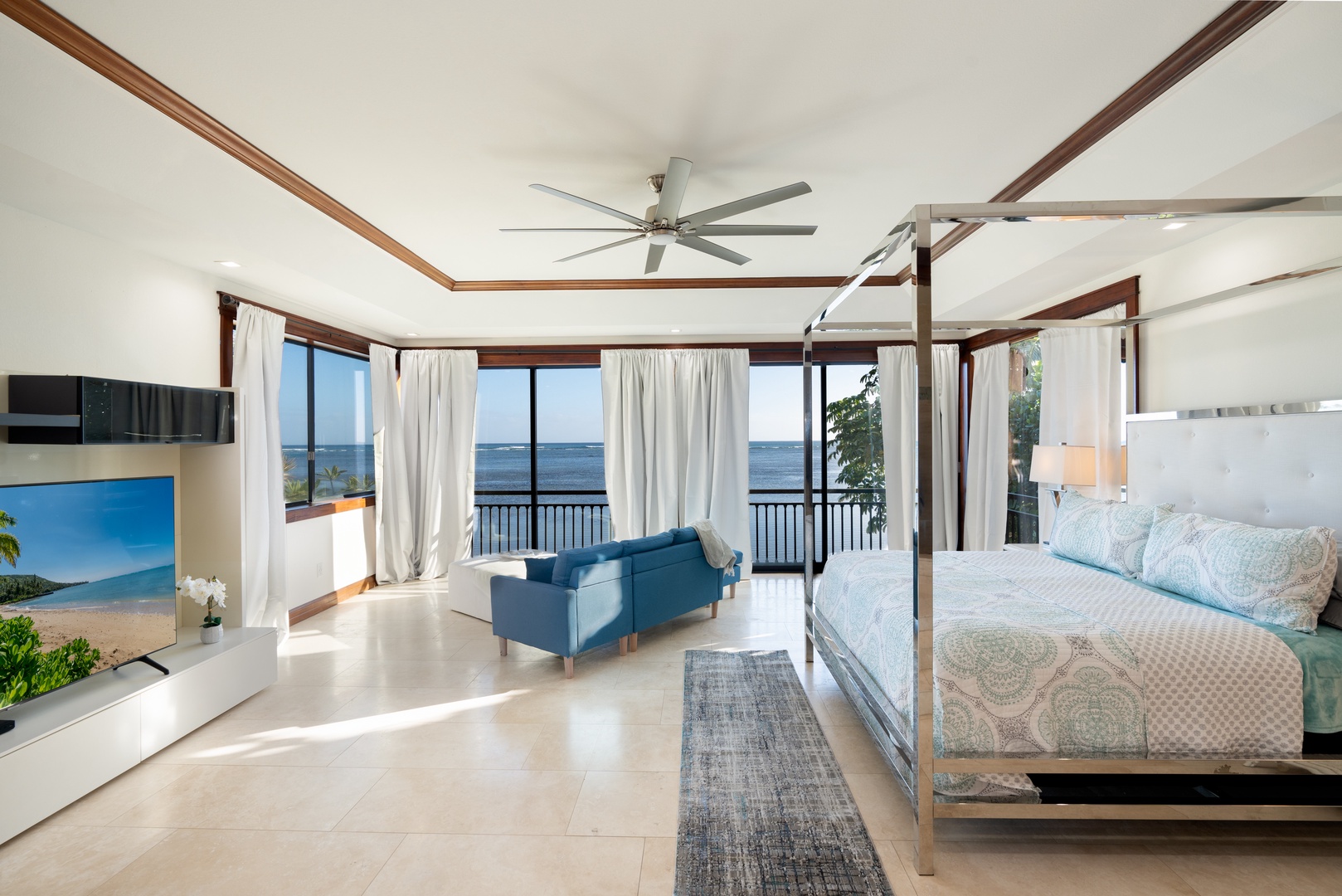 Honolulu Vacation Rentals, Wailupe Seaside 4 Bedroom - The primary suite has walls of windows with seating to enjoy the view.