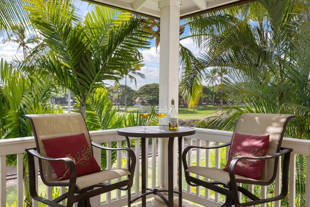 Kapolei Vacation Rentals, Coconut Plantation 1086-1 - Dine on the lanai under sun dappled palms.