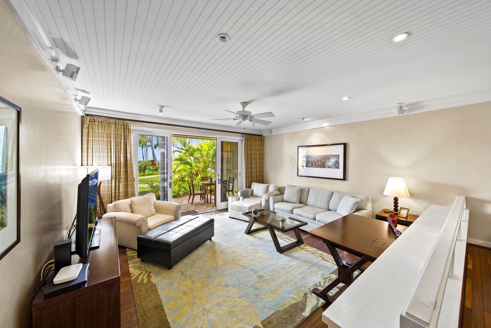 Kahuku Vacation Rentals, Turtle Bay Villas 112 - Spacious living area with Twin ottoman and Queen sized sofa pull out