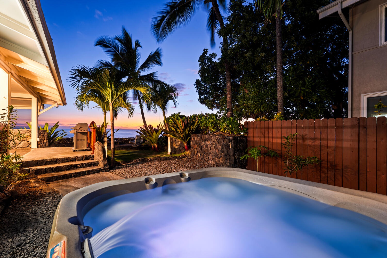 Kailua Kona Vacation Rentals, Honl's Beach Hale (Big Island) - Relax and rejuvenate in the bubbling hot tub surrounded by swaying palms.