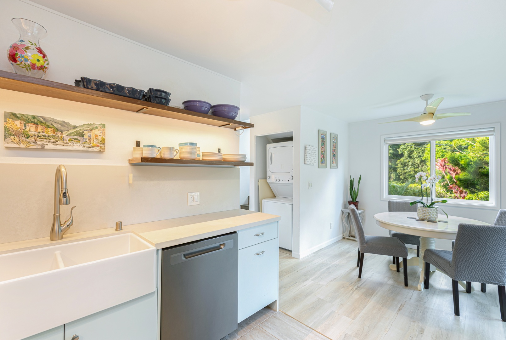 Princeville Vacation Rentals, Pohaku Kauai - Convenient kitchen layout opens to the dining area, keeping everyone connected.