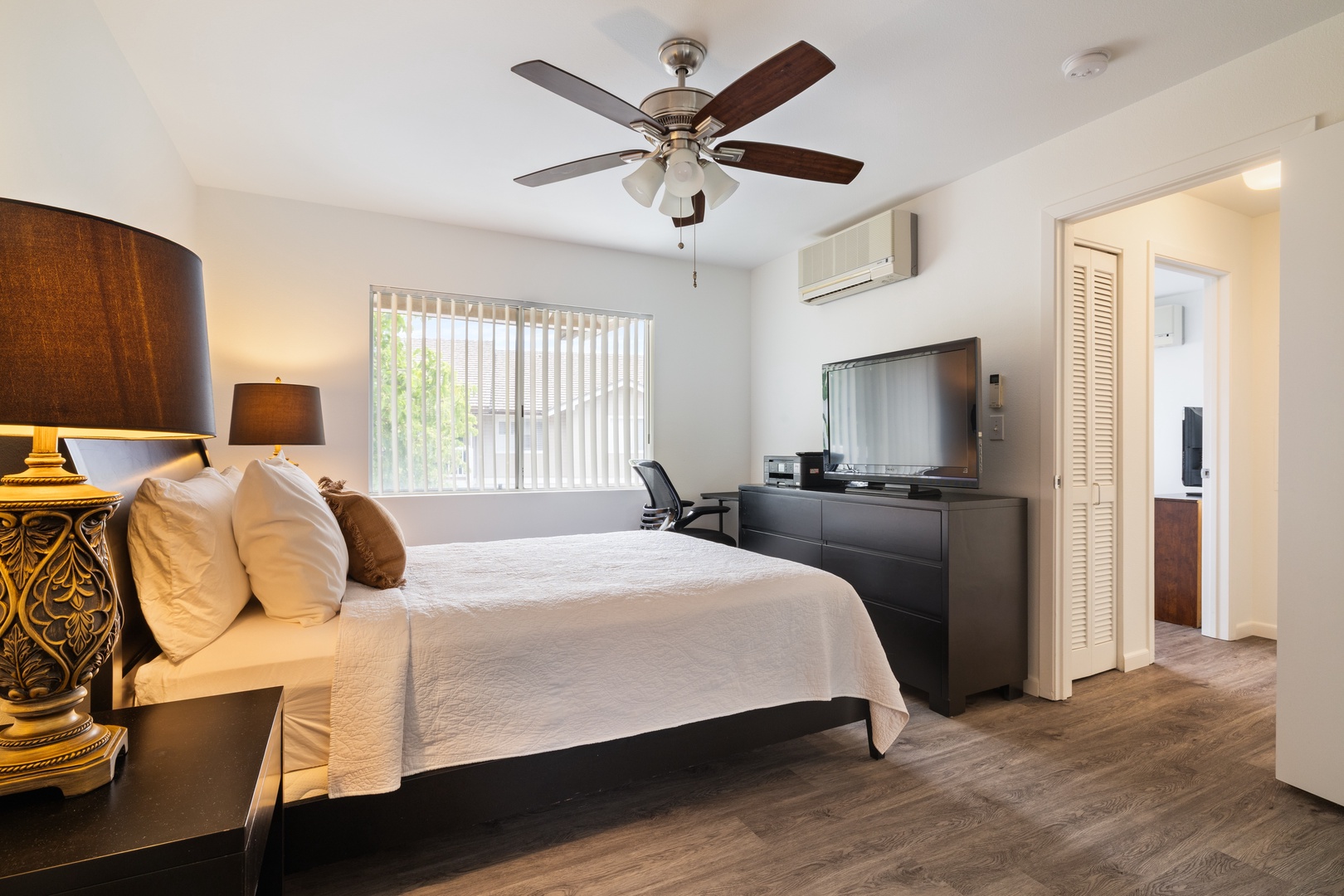 Kapolei Vacation Rentals, Fairways at Ko Olina 7A - Unwind in your spacious bedroom with plush bedding, modern amenities, and comfortable climate control for the perfect night's rest.