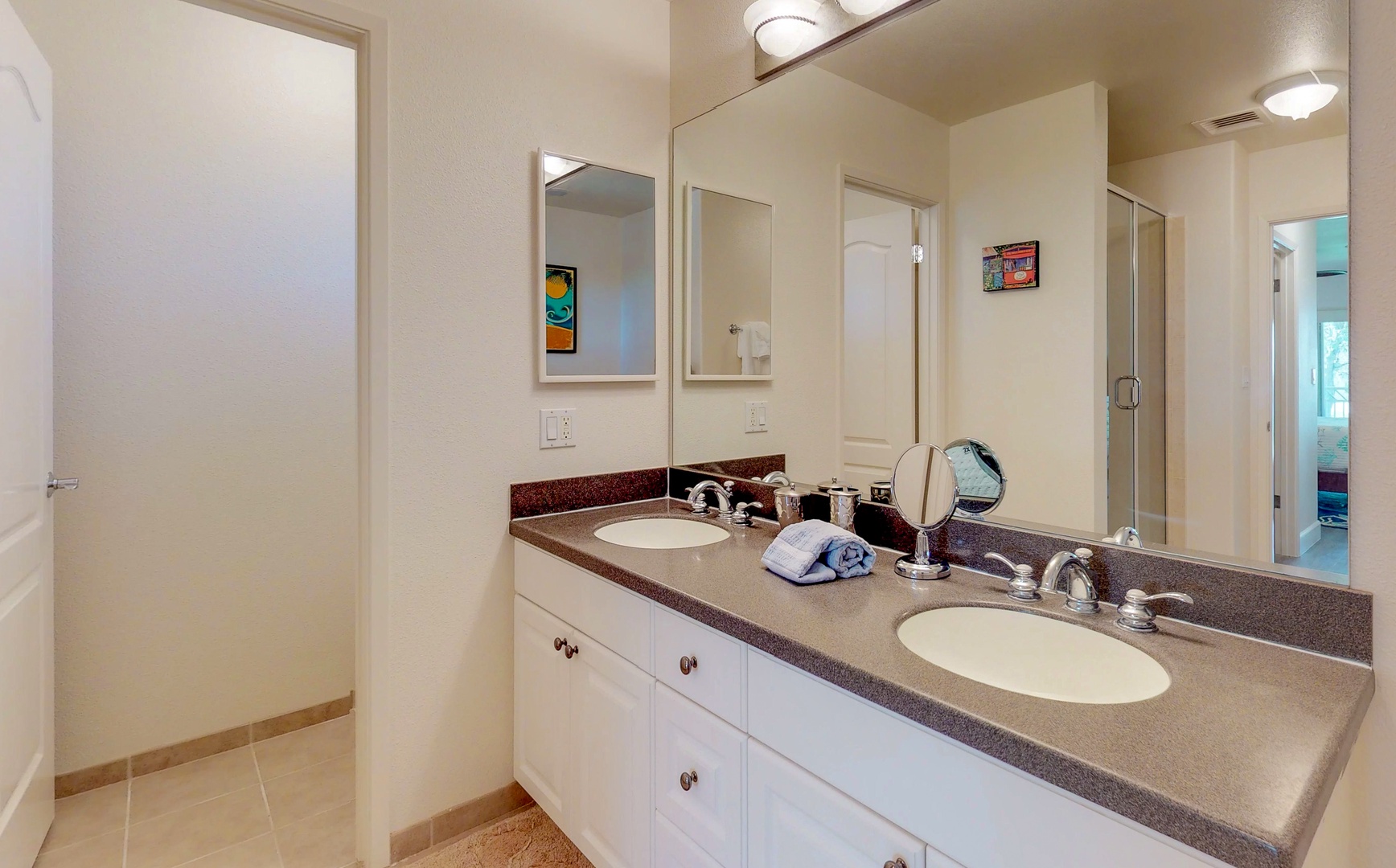 Kapolei Vacation Rentals, Ko Olina Kai 1051D - The primary guest bathroom with a large double vanity.
