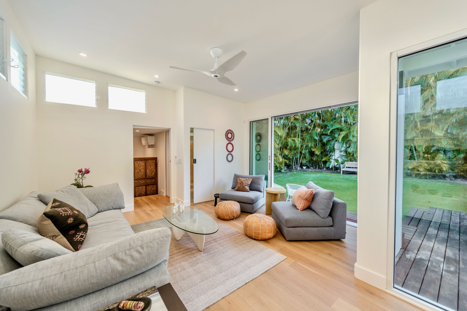 Kailua Vacation Rentals, Lanikai Ola Nani - Spacious and inviting, our great room is designed for connection and comfort—with high ceilings and garden-facing glass doors.
