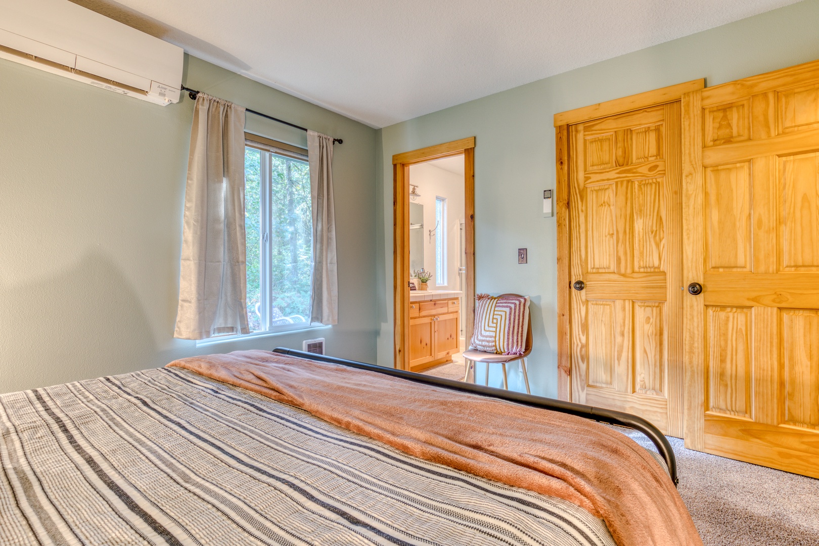 Brightwood Vacation Rentals, Riverside Retreat - Enjoy views of the garden from the privacy of the Primary Bedroom