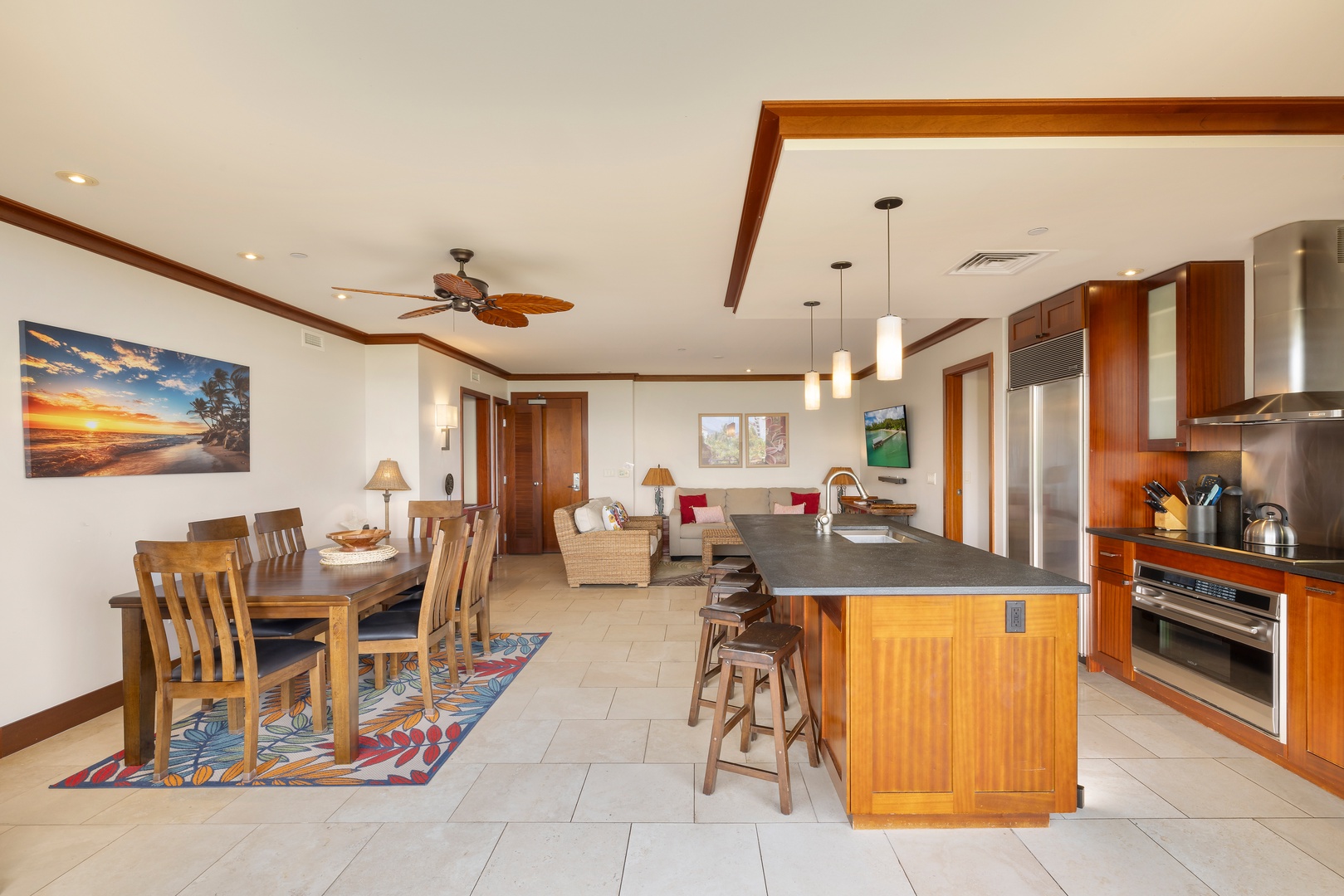 Kapolei Vacation Rentals, Ko Olina Beach Villas B506 - Gather your group in this beautiful open-concept space where kitchen, dining, and living areas flow seamlessly together for memorable meals and conversations.