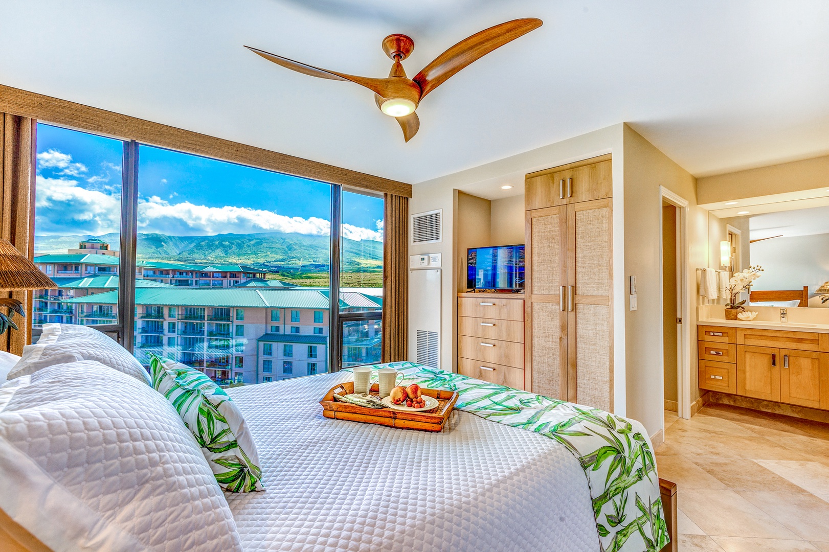 Lahaina Vacation Rentals, Mahana 1119 - The secondary bedroom has a queen-sized bed and large glass window with outdoor views.