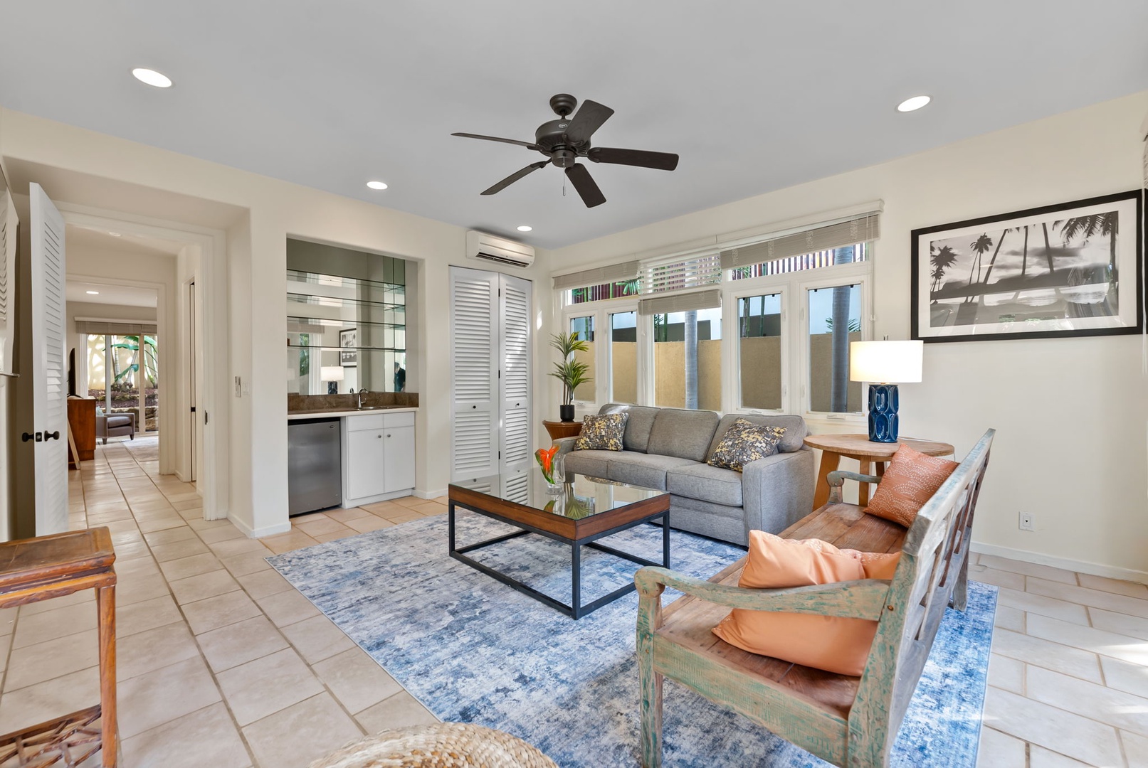 Honolulu Vacation Rentals, Diamond Head Luxe - Unwind in your stylish media room featuring comfortable seating, modern fixtures, and an open kitchen perfect for socializing.