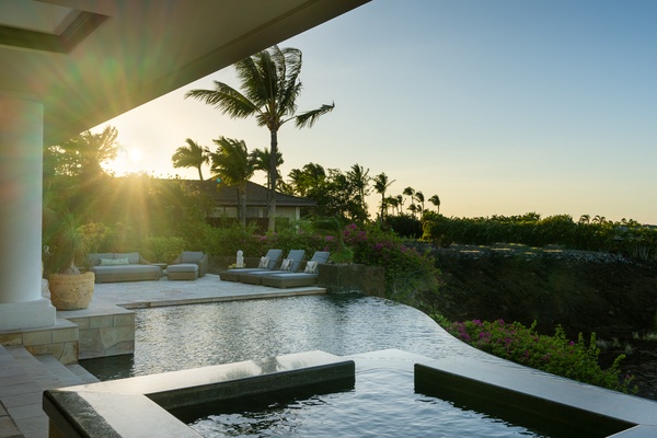 Kamuela Vacation Rentals, Canoe House & Beach Walker at Champion Ridge - Infinity pool and spa with sunset views, offering a tranquil and luxurious outdoor space for relaxation.
