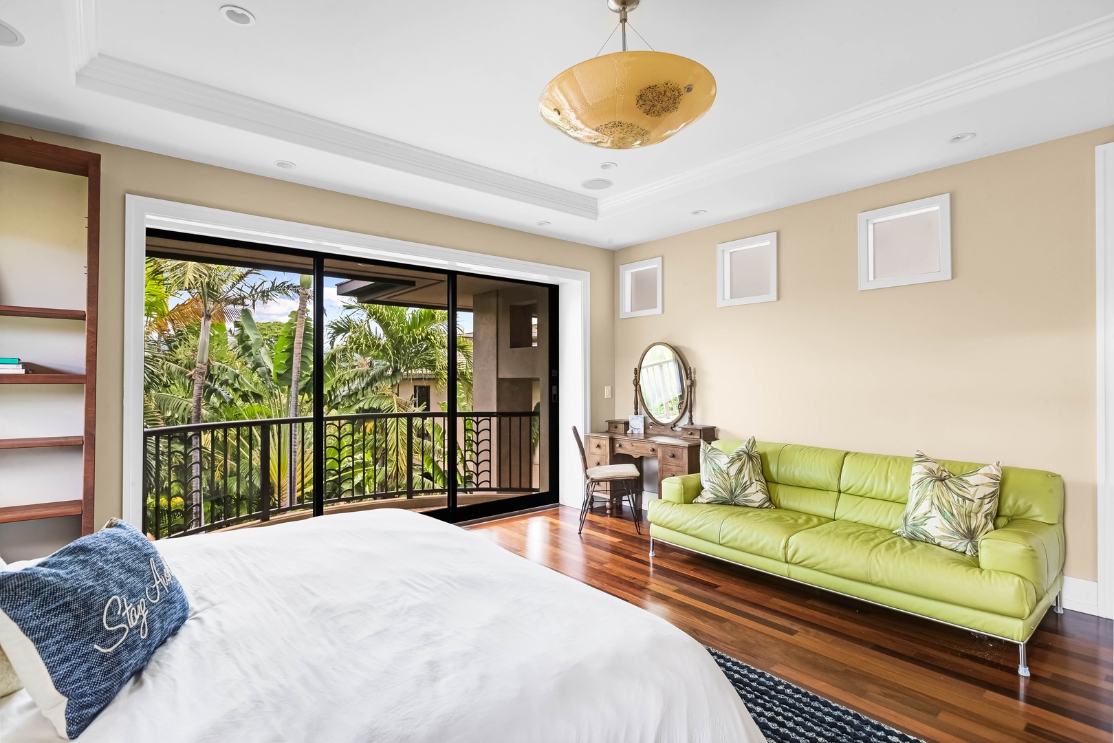 Honolulu Vacation Rentals, Pili Pono - King suite with lounge area and views through floor-to-ceiling windows.