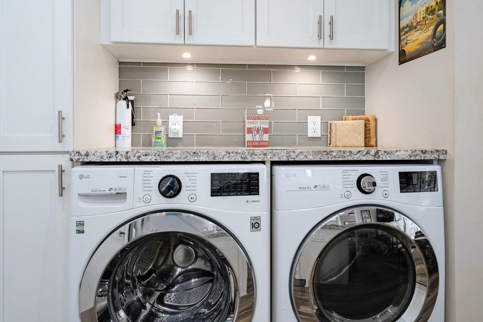 Kihei Vacation Rentals, Haleakala Shores A206 - In-unit laundry handles the sandy beach clothes before they get back home.
