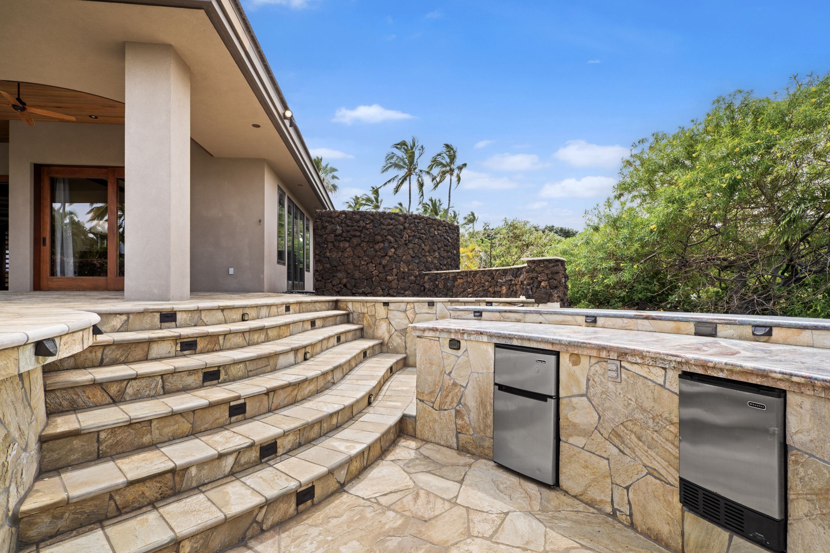 Kamuela Vacation Rentals, Hale Konane - Grill poolside with built-in stone counters and island breezes—perfect for sunset dinners.