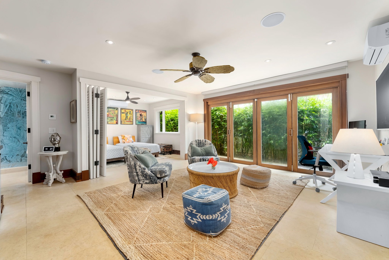Kailua Vacation Rentals, Leaf House - You'll love relaxing in this bright, airy living room with elegant furnishings and natural light pouring through large garden-view doors. The ceiling fan and AC keep you comfortable year-round.